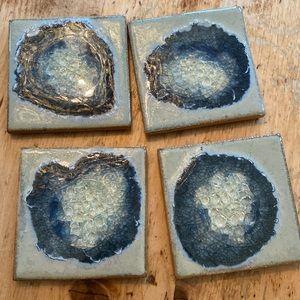 I Anthropologie set a four lapis blue coasters